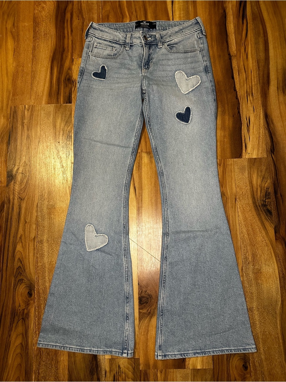 Hollister Low Rise Flare Jeans Heart Patch Light Wash Stretch Denim Women’s W25R
